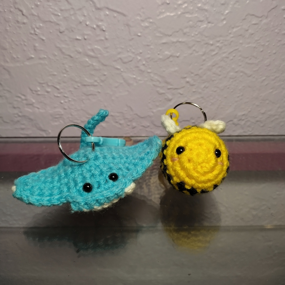 Crochet stingray and bee keychains